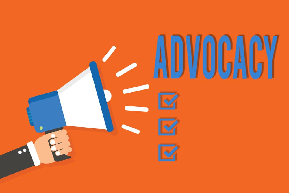 Word writing text Advocacy. Business concept for Profession of legal advocate Lawyer work Public recommendation Man holding megaphone loudspeaker orange background message speaking loud