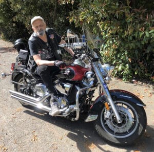 Cameron Hanson sitting on his motorcycle.