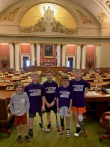 Logan Pieper and his friends at the Capitol to speak on behalf of the bill.