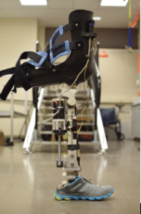single prosthetic leg stands in a room