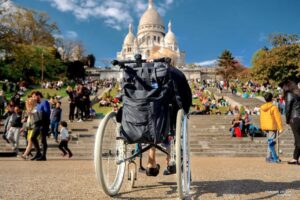 Wheelchair user admiring the Basilica of Sacré Coeur
